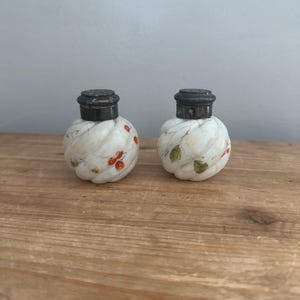 Set of vintage milk glass painted salt and pepper shaker with metal lids