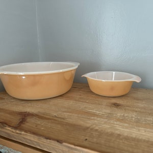 Vintage large and small Fire King peach lustre casserole bowls