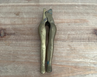Vintage brass nutcracker in shape of women's legs