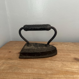 Antique cast iron sad iron