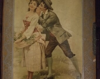 possibly Brundage Victorian Celluloid Photo Album depicting an Adorable Girl holding Her Kitten