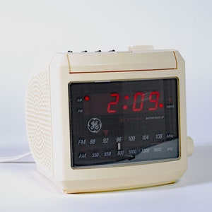 Retro-faded 90s GE Alarm Clock Radio Model No. 7-4606WHA