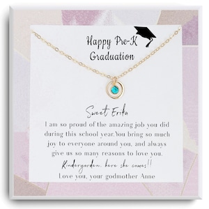 May include: A gold necklace with a turquoise gemstone pendant and a card that reads "Happy Pre-K Graduation Sweet Erika I am so proud of the amazing job you did during this school year. You bring so much joy to everyone around you, and always give us so many reasons to love you. Kindergarten, here she comes!!! Love you, your godmother Anne"
