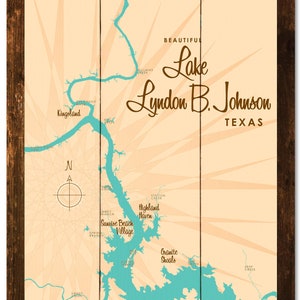 May include: A vintage-style map of Lake Lyndon B. Johnson in Texas, with a teal blue lake and river system against a beige background. The map includes place names like Kingsland and Horseshoe Bay, and is framed in dark wood.