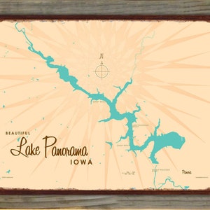 May include: A vintage-style map of Lake Panorama in Iowa, with a teal blue lake and a compass rose. The map is framed in a dark brown border and set against a light tan background. The words "Beautiful Lake Panorama Iowa" are displayed.