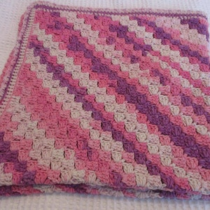 Hand crochet baby blanket shades of pink and purple cotton mix
