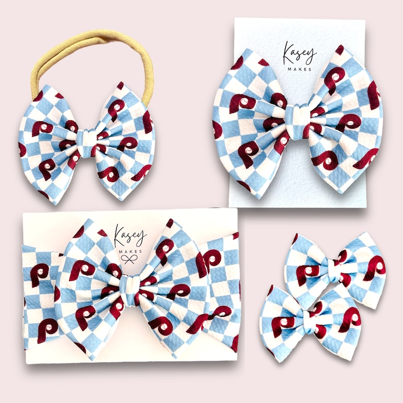BLUE CHECK PRINT WITH 5 INCH BOW ON ALLIGATOR CLIP AND 5 INCH BOW ON INFANT HEAD WRAP, 3 INCH PIGGIES, INFANT NYLON