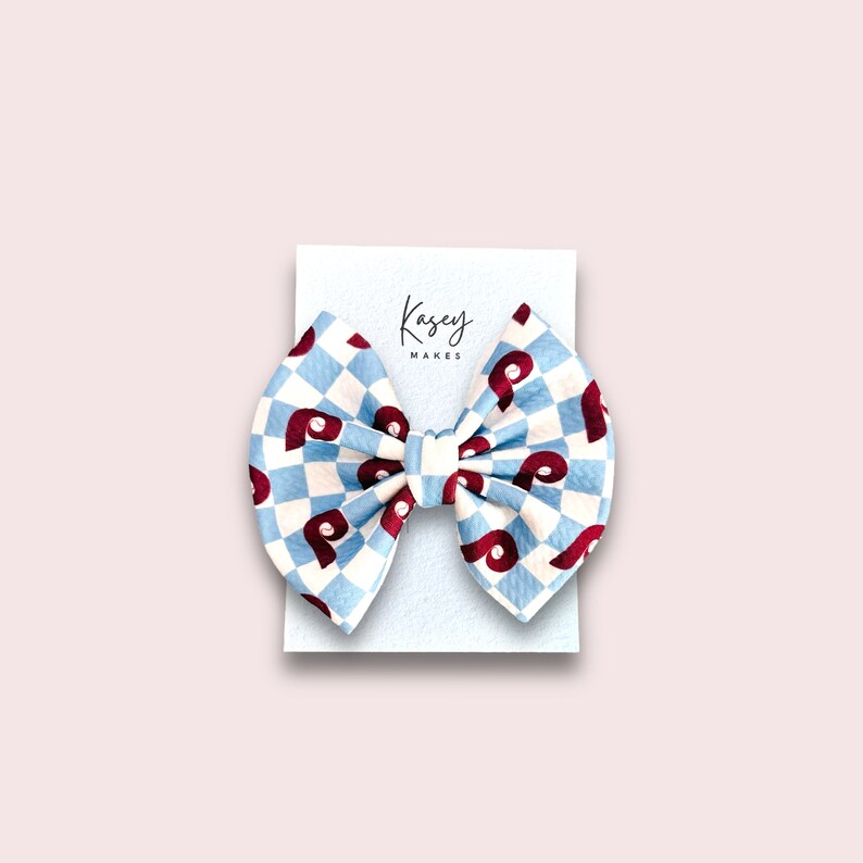 POWDER BLUE CHECK PRINT WITH 5 INCH BOW ON ALLIGATOR CLIP