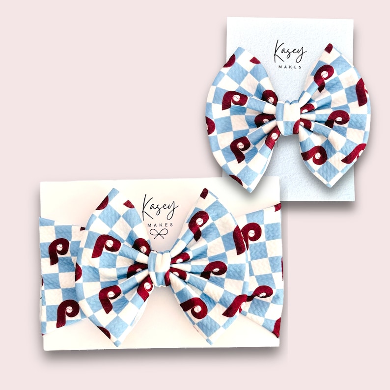POWDER BLUE CHECK PRINT WITH 5 INCH BOW ON ALLIGATOR CLIP AND 5 INCH BOW ON INFANT HEAD WRAP. Kasey Makes Bows, Headbands and more!  Follow me @KASEY_MAKES