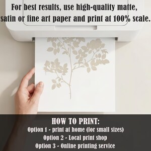 May include: A white printer outputting a sheet of paper with a beige botanical rose branch illustration. The text reads: For best results, use high-quality matte, satin or fine art paper and print at 100% scale. HOW TO PRINT: Option 1 - print at home (for small sizes) Option 2 - Local print shop Option 3 - Online printing service.