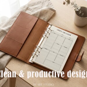 May include: A tan leather binder with a six-ring metal mechanism holding white paper inserts. The top page features the text OFFICE ORGANIZER with columns for date, time, task, project, priority, and notes. The cover has interior pockets.