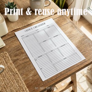 May include: A white paper sheet titled OFFICE ORGANIZER with black printed lines and sections for month, date, year, to-do, calls, email, projects, reminders, meetings, follow-up, due dates, and notes, displayed on a wooden desk surface.