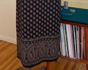 Size 10 pencil skirt. Black super soft, peached-twill fabric with golden brown paisley border print.