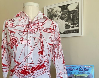 Women’s size small white and red blouse. Amazing print of a couple sailing
