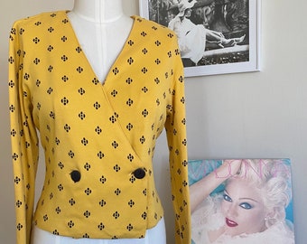 Women’s size medium Talbots knit top with button closure