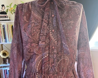 1980's A-line Purple Paisley Dress. Size 11/12. Pleated skirt. Elastic waist. Great condition.