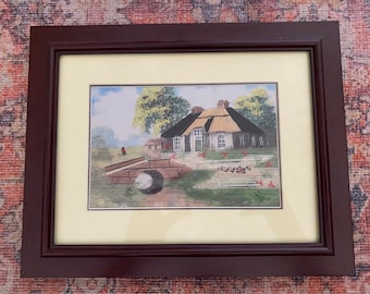 Framed embroidered landscape