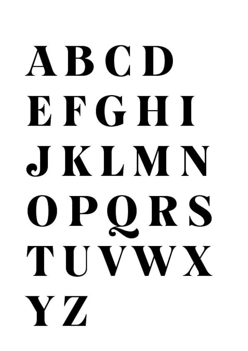 May include: A black serif font alphabet, from A to Z, is displayed on a white background. The letters are arranged in rows, with each row containing a sequence of letters. The font is bold and clear.