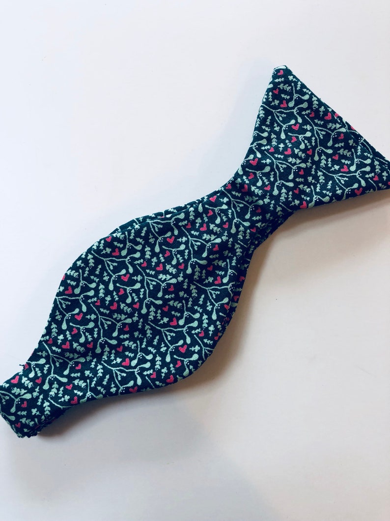 Handmade green bow tie and pocket square with mistletoe print
