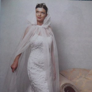 Lace Appliqued Organza Bridal Cape. Available in white or ivory.