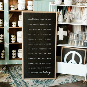 Vertical Welcome Come In And Stay Awhile This Is Where You Belong Framed Wood Sign