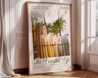 May include: A framed poster with a beach scene featuring surfboards and palm trees. The poster has the text "The Coastal Life" and "The Coast is Calling". The date "07/2023" is also visible.