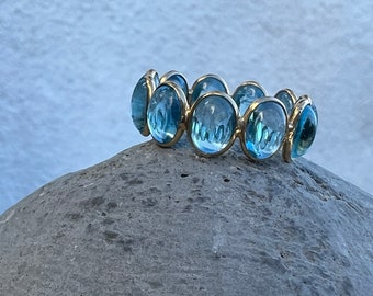 Aquamarine and 14 Carat Gold Eternity Band