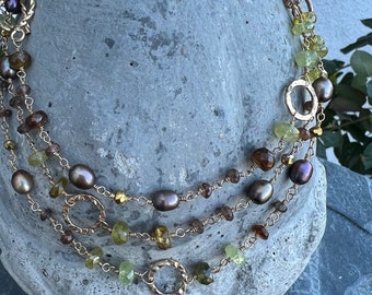 Green garnet, andalusite, pearl and gold circle wire wrapped necklace