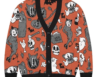 May include: An orange V-neck cardigan with a black button placket, cuffs, and hem. The fabric features a repeating pattern of black and white illustrations including skulls, ghosts, devils, cats, bats, candles, and a book labeled Hocus Pocus.