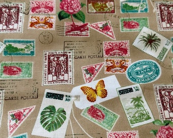 Paradise Travel Stamps in Tan Cotton Fabric by the yard