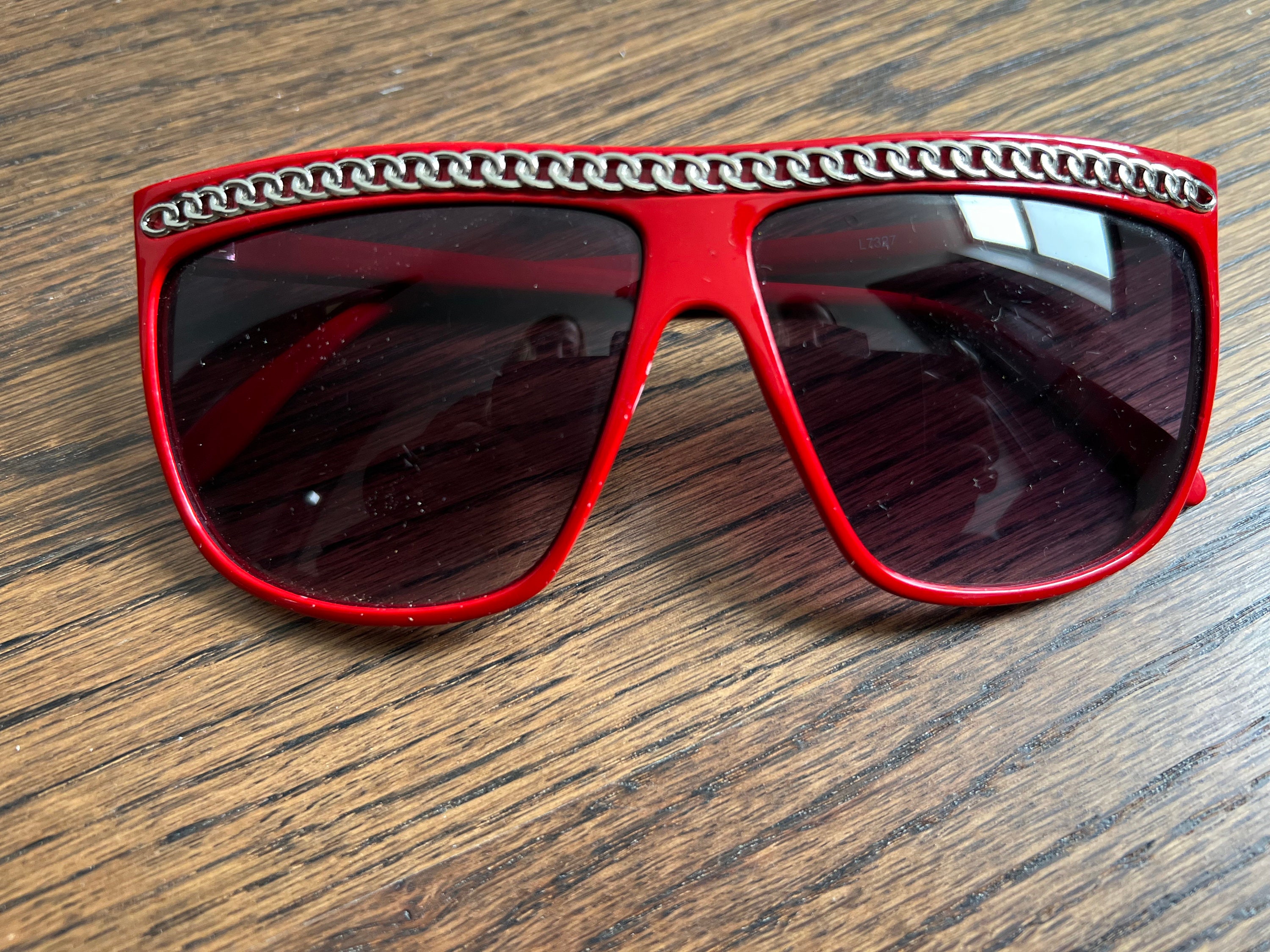 Vintage 1980s Mob Wife Sunglasses. Red With a Silver Chain  display picture 3