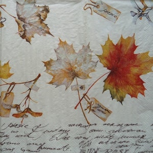 May include: A white napkin with a handwritten message and a design of autumn leaves. The leaves are in shades of brown, yellow, orange, and red. The leaves are attached to branches with small tags that say "please" and "romance".