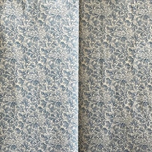 May include: A white ceramic mug with a black handle and the text "But First, Coffee" in a handwritten style. The mug is on a white surface. The mug is approximately 4 inches tall.