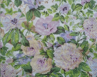May include: A white background with a floral pattern featuring pink, yellow, and purple flowers with green leaves.