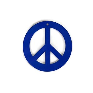 May include: A blue peace sign ornament. The peace sign is a circle with a stylized dove inside.