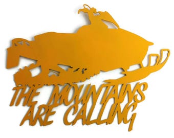 The Mountains Are Calling Metal Snowmobile Wall Art 22 Inches Wide