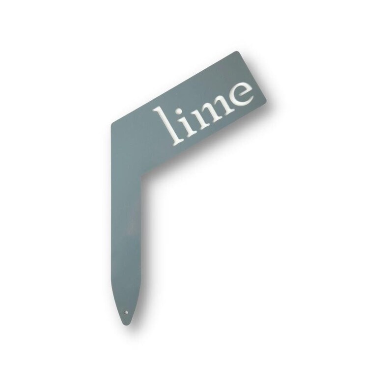 May include: A gray metal garden marker with the word "lime" printed in white.