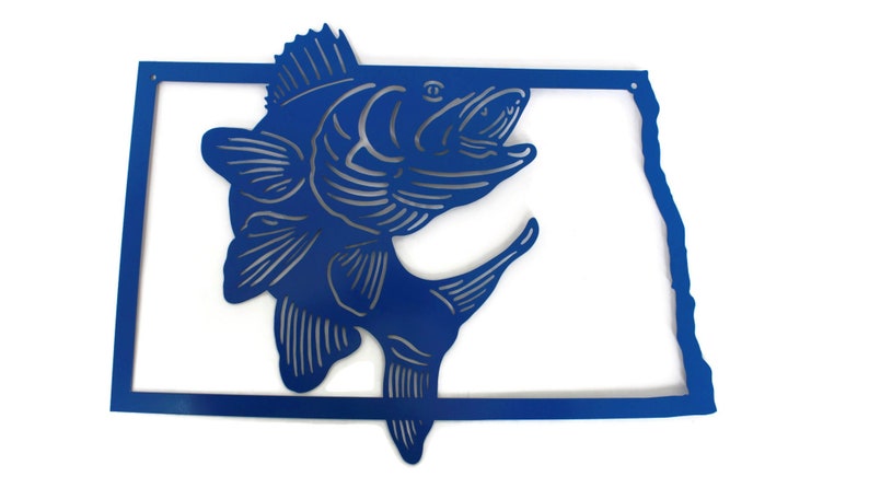 May include: A blue metal wall art piece featuring a leaping fish design within the outline of a state. The fish is detailed with etched lines, and the state outline has a clean, modern aesthetic. The artwork is suitable for home decor.