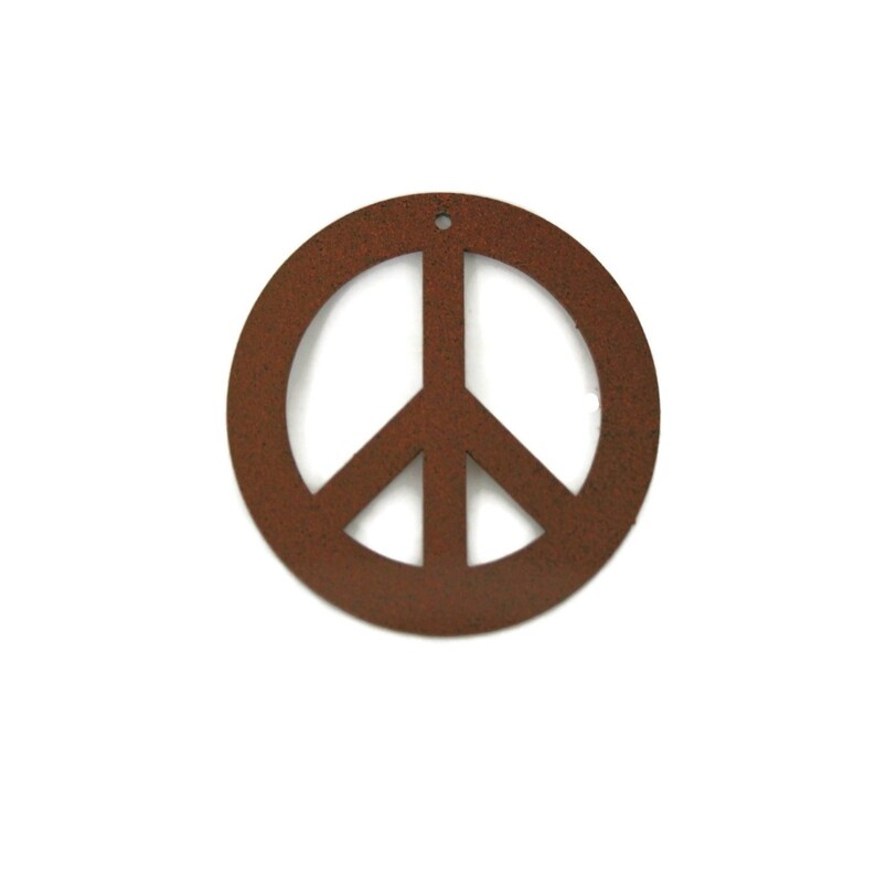 May include: A rusty brown metal peace sign ornament. The peace sign is a circle with a stylized dove inside.
