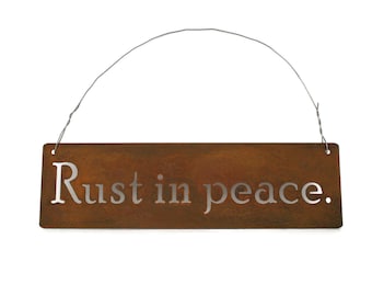 Rust in peace. Metal Garden Sign 14 Inches Wide