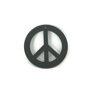 May include: A black peace sign cutout, a symbol of peace and love, is shown against a white background.