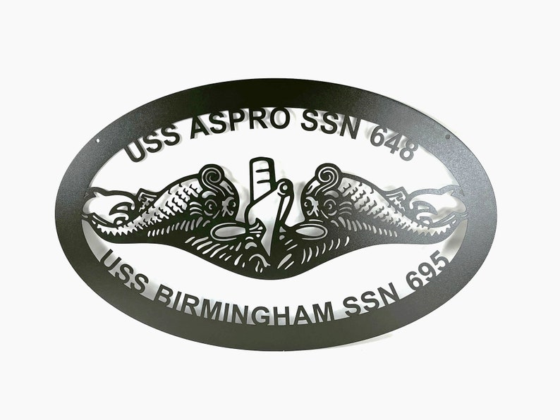 May include: Black metal oval sign with the text "USS ASPRO SSN 648" and "USS BIRMINGHAM SSN 695" and a stylized submarine emblem.