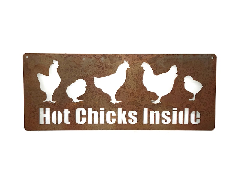 May include: A rusty metal sign with a white silhouette of five chickens and the text "Hot Chicks Inside".