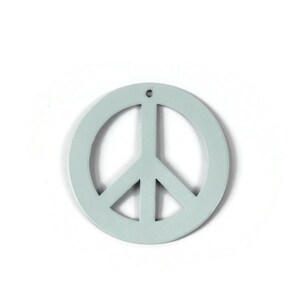 May include: A light blue peace sign ornament. The peace sign is a circle with a stylized dove inside.