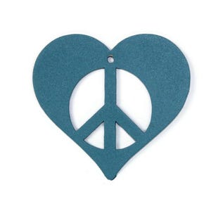 May include: A teal blue heart-shaped ornament with a peace sign cut out in the center.