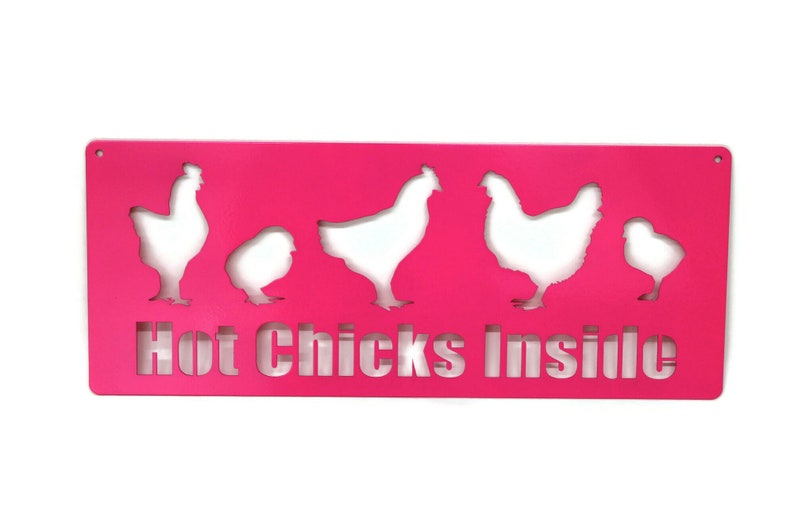 May include: A pink metal sign with the text "Hot Chicks Inside" and five white chicken silhouettes cut out of the metal.