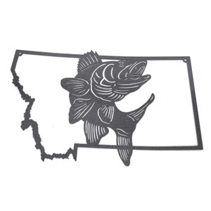 May include: A black metal silhouette of a fish jumping out of the water, superimposed over the outline of the state of Montana.
