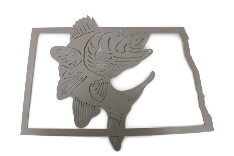May include: A gray metal wall art piece featuring a leaping fish design within the outline of a state. The fish is detailed with fins and scales, and the state outline is a simple, clean border. The artwork is suitable for indoor or outdoor display.