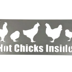 May include: A metal sign with a rustic finish featuring a silhouette of five chickens and the text "Hot Chicks Inside".