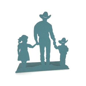 May include: A blue metal silhouette of a family with a father, daughter, and son. The father is wearing a cowboy hat and the children are holding hands.